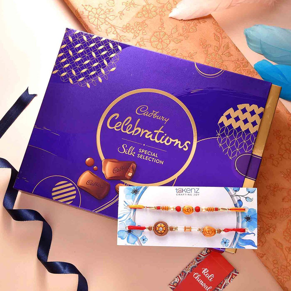 Om Set Of 2 Rakhis With Cadbury Celebration Box