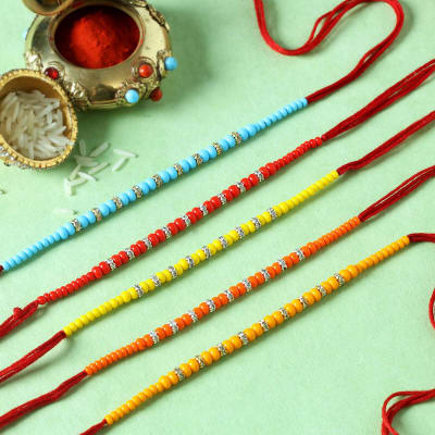 Ring Rakhis with Multicolour Beads (Set of 5)