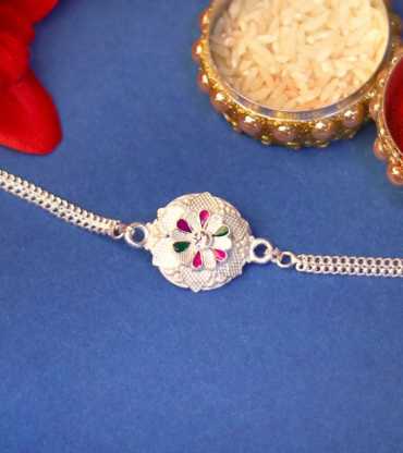 Flower Patterned Silver Rakhi