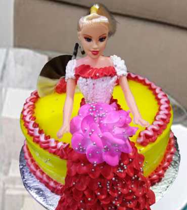 Barbie Sitting On Cake