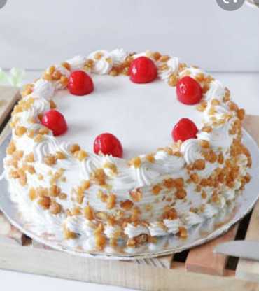 Butterscotch Cake With Cherry Topping