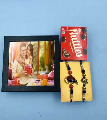 Peacock Feather  And Om Rakhi With Gift