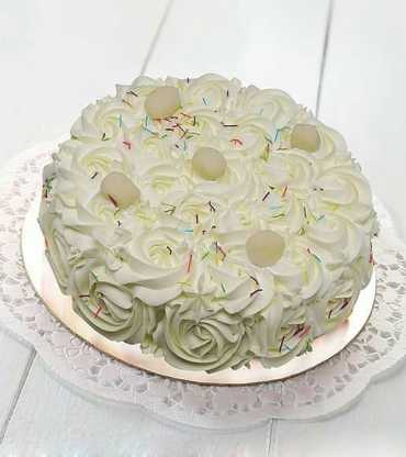 Rose Cream Topped With Rasgulla Cake
