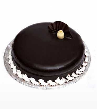 Round dark chocolate cake