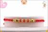 Red Bead Diamond Rakhi with Golden Beads